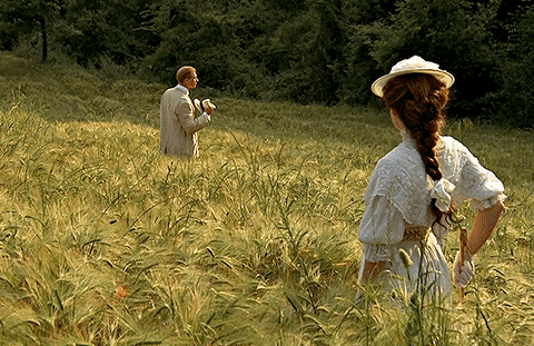 man and woman in the field